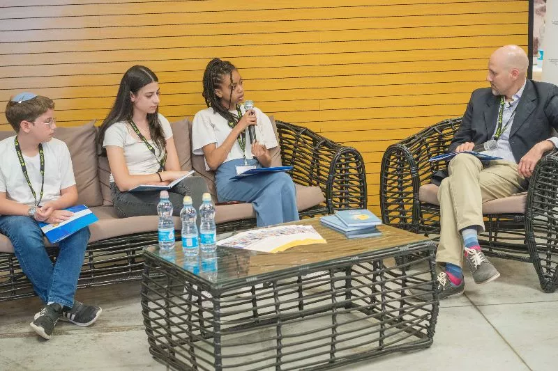 A panel of 3 students and a supervisor