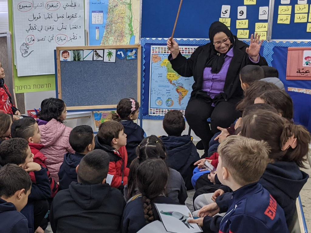First grade students learning to read Arabic