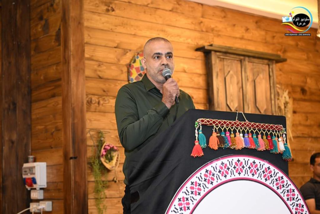 Principal Muhammad Abu Aqel addressing the Ar’ara community at the Alsalam centennial banquet