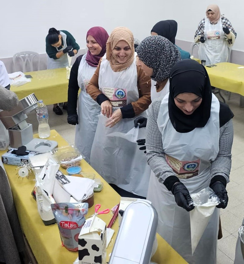 Mothers participate in a fun activity to encourage more active involvement in the school community and their children’s education